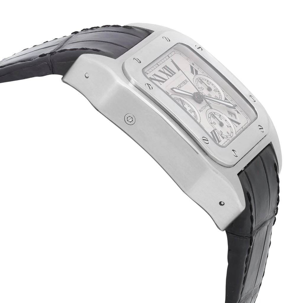 An image of a pre-owned Cartier men's luxury wristwatch with a side profile view opposite of the crown. The watch features a square stainless steel case with a steel bezel and a silver dial that includes a chronograph, date indicator, luminous hands, and a small seconds subdial. Attached is a black leather band, and the watch is positioned at a slight angle, with the dial facing towards the left side of the frame, allowing a clear view of the side and curvature of the case. The image is taken from a close distance, highlighting the textures and details of the watch components.