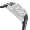 An image of a pre-owned Cartier men's luxury wristwatch with a side profile view opposite of the crown. The watch features a square stainless steel case with a steel bezel and a silver dial that includes a chronograph, date indicator, luminous hands, and a small seconds subdial. Attached is a black leather band, and the watch is positioned at a slight angle, with the dial facing towards the left side of the frame, allowing a clear view of the side and curvature of the case. The image is taken from a close distance, highlighting the textures and details of the watch components.