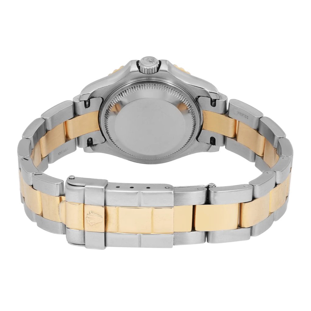 An image of a pre-owned wristwatch showcasing the back view with a closed clasp. The watch has a two-tone metal bracelet, featuring both silver and gold links. The focus is on the clasp and the back of the watch case, captured at a close distance and straight angle.
