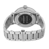 An image of a wristwatch viewed from the back, showcasing the clasp and stainless steel bracelet. The watch, positioned in the center, features a circular case with visible screws and brand markings. The angle is slightly elevated, focusing on the closed clasp. The photograph is taken from a close distance, highlighting the watch's polished metal finish and intricate details.