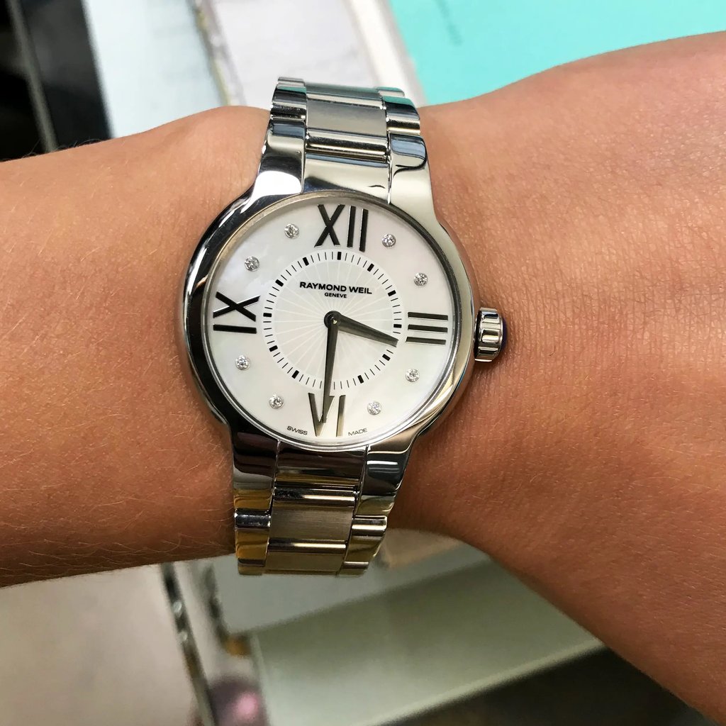 Up Close Front Facing Picture Of RAYMOND WEIL 5932-ST-00995 Stainless Steel Watch Pre Owned Condition