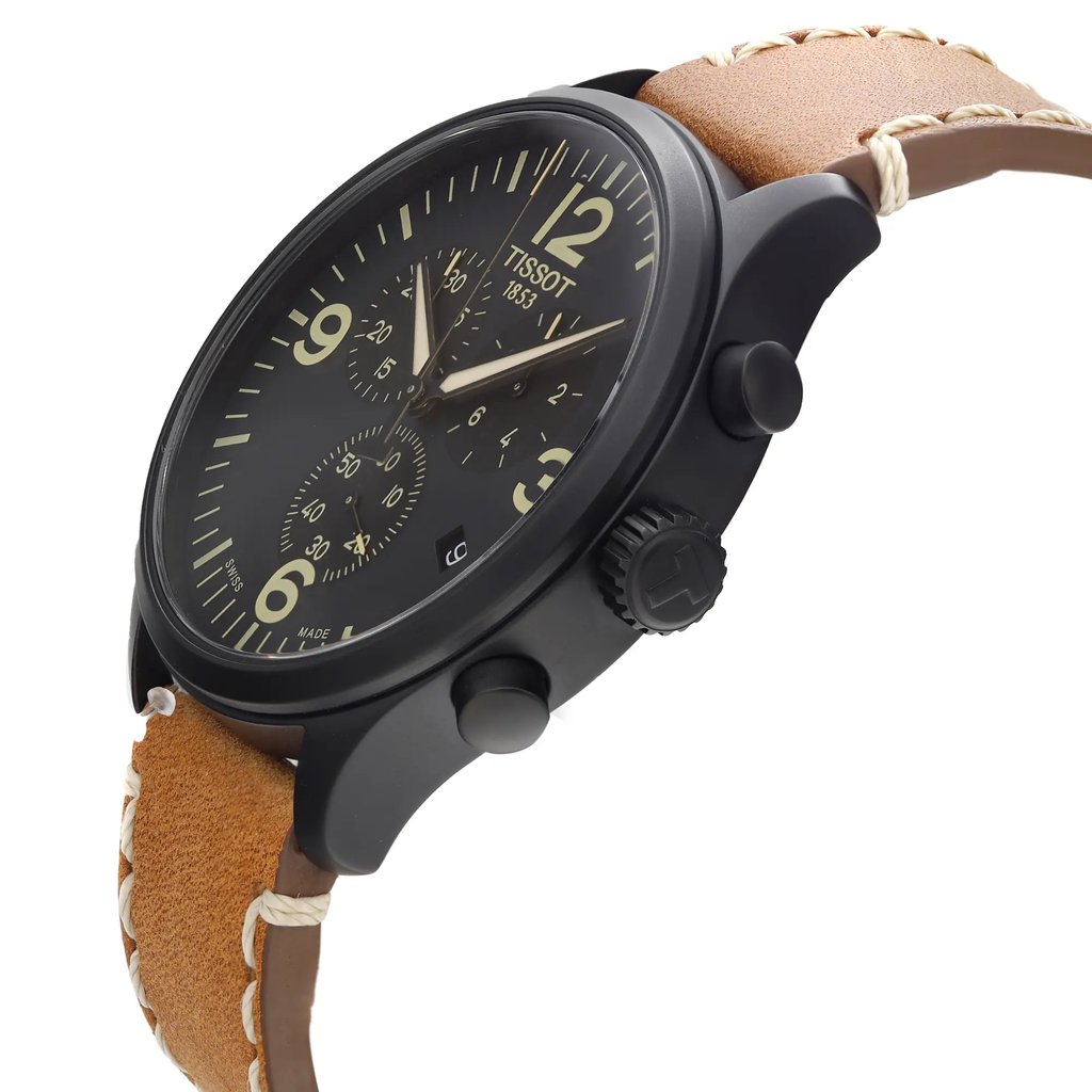 An image of a Wristwatch by Tissot. This New With Defects item is designed for Men, featuring a Dress/Formal style. It has a Quartz movement and an Analog display with a Black dial color. The indices include 12-Hour Dial,Seconds Hand,Stick Indexes. The band is made of Leather and the case is made of Stainless Steel. The watch has a Round shape with a case size of 45 mm and a case thickness of 11 mm.