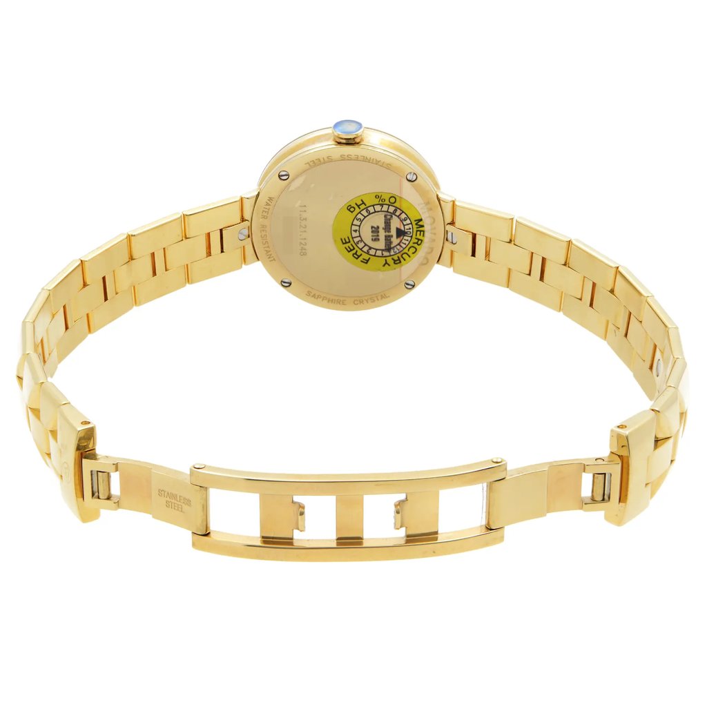 An image of a wristwatch shown from the back view, featuring an open clasp. The watch is positioned at a slight angle, allowing a clear view of the gold-colored metal bracelet and the back of the watch face. The image is taken from a moderate distance, capturing the full length of the wristwatch and highlighting its display model condition.