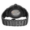 An image of a pre-owned wristwatch showcasing the back view at a close distance. The focus is on the open clasp and the transparent case back, which reveals the internal mechanical components. The watch has a dark metal bracelet with visible links and the brand name "Edox" inscribed on the clasp.