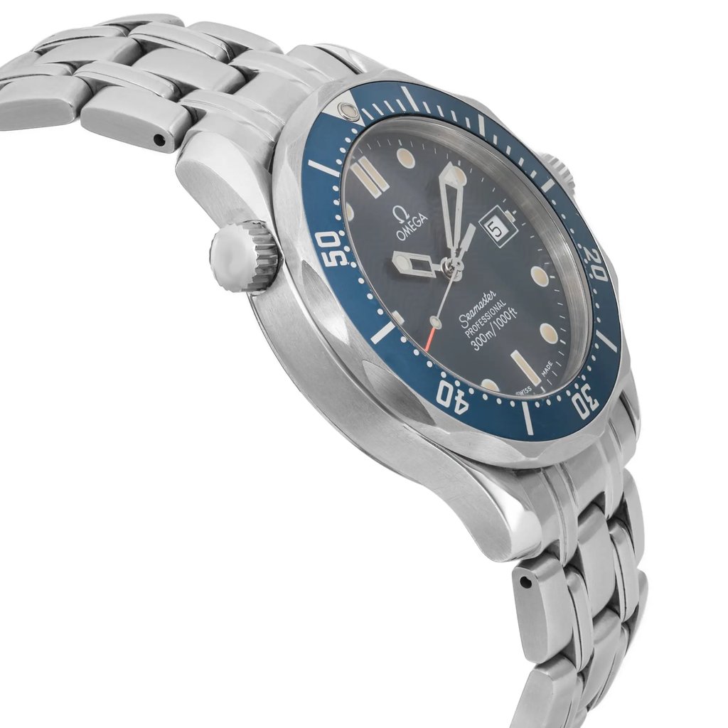 An image of a pre-owned wristwatch captured from a side profile view opposite the crown. The watch features a stainless steel bracelet and a blue bezel, with a visible round face displaying the brand and specifications. The angle highlights the watch's thickness and the design of the bracelet links, taken from a close distance.