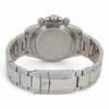 An image of a pre-owned men's Rolex wristwatch taken from a rear angle. The focus is on the stainless steel back case and bracelet, with the watch positioned horizontally. The clasp, engraved with the brand's logo, is prominently visible in the foreground. The crown and pushers are visible on the right side of the case, highlighting the chronograph feature. The image is taken at close range, showcasing the watch’s sleek and polished finish.