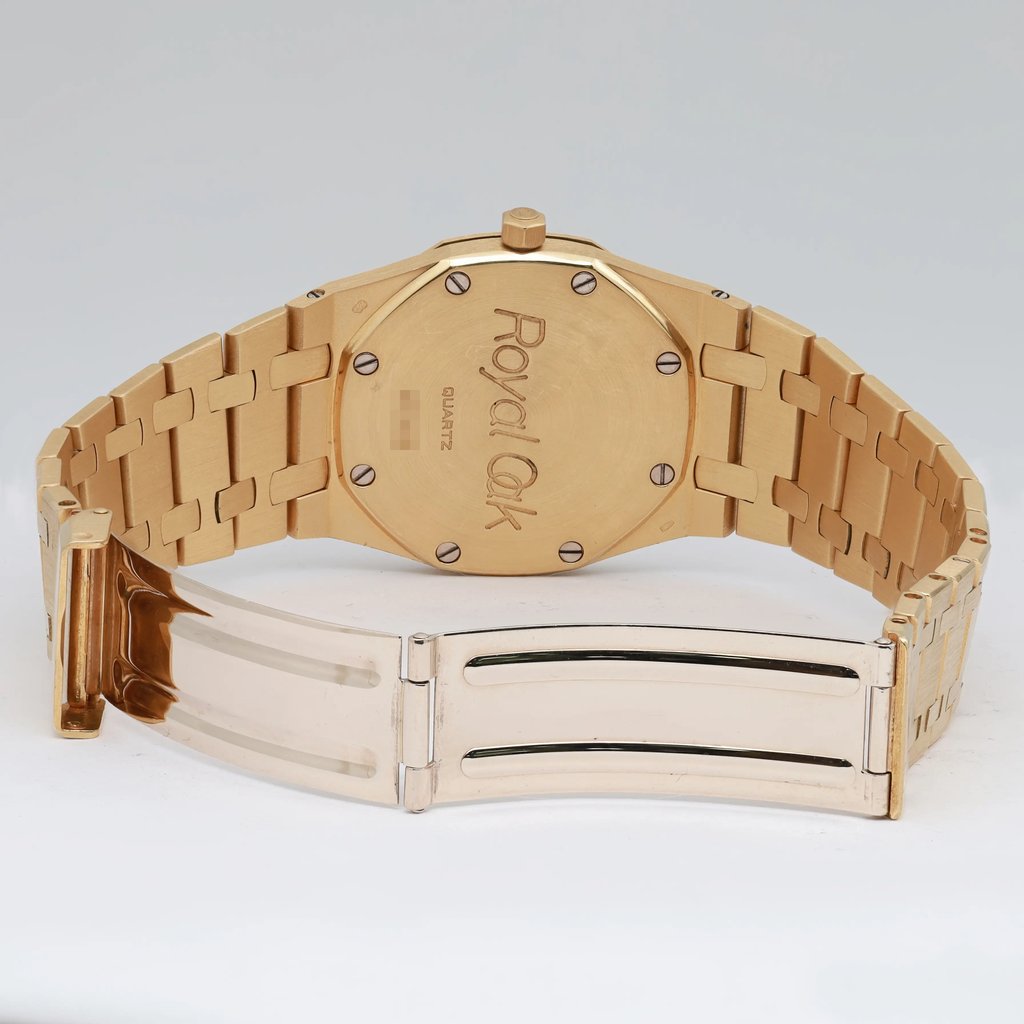 Back View Of {Caseback} Back Case And Open Yellow Gold Band Of Audemars Piguet 56175ba Watch Pre Owned Condition