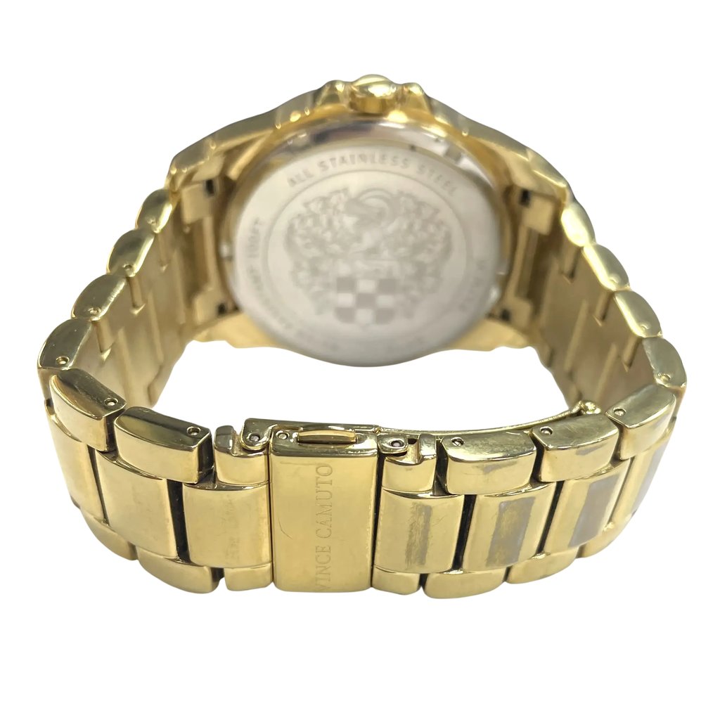 An image of a Wristwatch by Vince Camuto. This Pre Owned item is designed for Women, featuring a Dress/Formal style. It has a Quartz movement and an Analog display with a Mother of Pearl dial color. The indices include 12-Hour Dial,Roman Numerals. The band is made of Stainless Steel and the case is made of Stainless Steel. The watch has a Round shape with a case size of 43 mm and a case thickness of 11 mm.