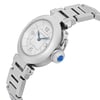 An image of a pre-owned women's Cartier wristwatch. The watch is positioned at a slight angle, showcasing the round silver dial with black numerals and blue hands. The stainless steel bracelet is partially visible, and the crown features a blue cabochon. The photograph is taken from a close-up perspective, highlighting the watch's elegant details.