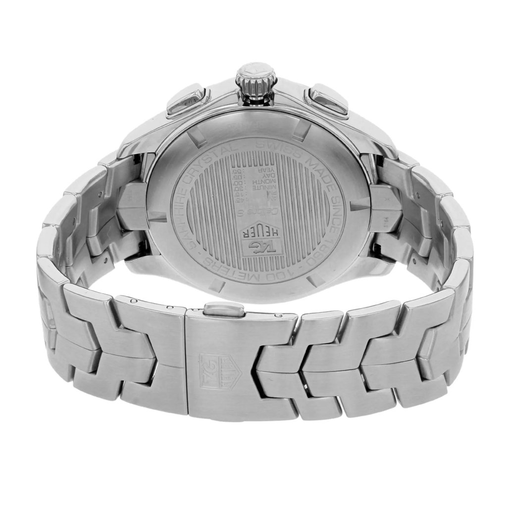An image of a pre-owned men's TAG Heuer wristwatch showcasing the back view with a focus on the closed clasp. The watch features a round stainless steel case and band, with a screwback caseback. The angle is slightly elevated, capturing the chronograph buttons and crown from a close distance. The stainless steel band is prominently displayed, emphasizing its polished links.