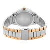 An image of a Bulova women's wristwatch featuring a stainless steel caseback and a two-tone stainless steel band with gold accents. The watch is displayed with the back of the case facing upwards and the fold-over clasp with double push buttons is closed, positioned in the center. The watch is photographed from a top-down angle, providing a clear view of the snap caseback and the brand name inscribed on it. The round shape of the watch is evident, and the condition appears to be a display model with no visible wear. The image is taken from a close distance, showcasing the details of the watch's design and construction.