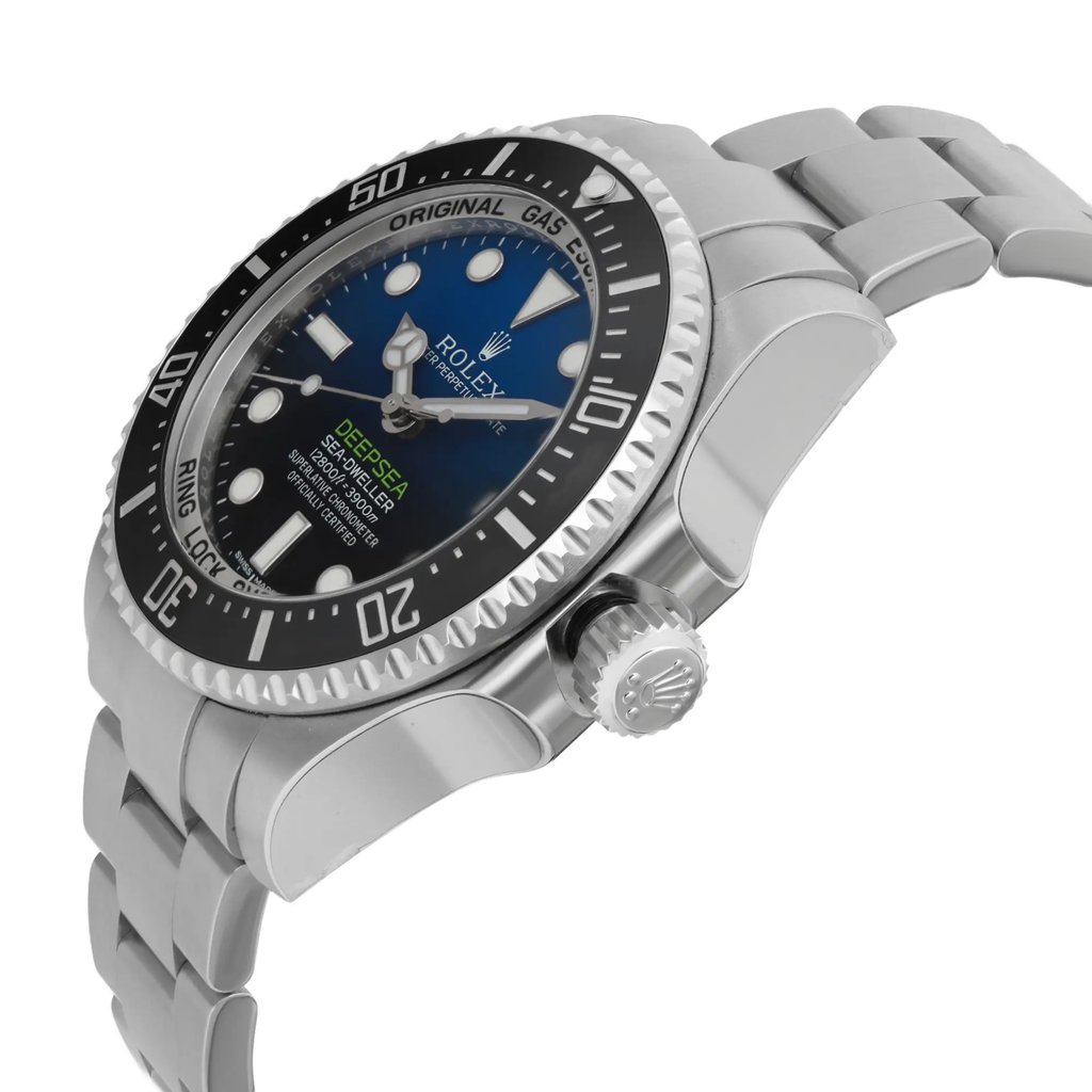 An image of a wristwatch shown from a side profile view, highlighting the unworn condition and the prominent crown. The angle allows for a clear view of the watch face and bezel, with the watch positioned slightly tilted upwards. The distance is close-up, emphasizing details of the metallic bracelet and the intricate design on the crown.