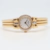 An image of a Wristwatch by Chopard. This Pre Owned item is designed for Women, featuring a Luxury style. It has a Quartz movement and an Analog display with a White dial color. The indices include Dots. The band is made of Yellow Gold and the case is made of Yellow Gold. The watch has a Round shape with a case size of 19 mm and a case thickness of 5 mm.