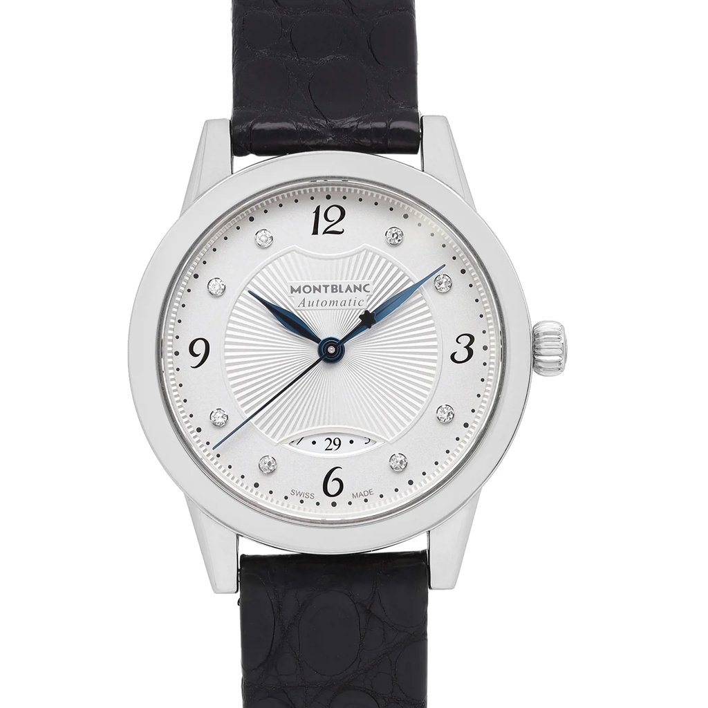 An image of a pre-owned Montblanc women's wristwatch, presented in excellent condition. The view is a front close-up, focusing on the watch face which is round with a silver dial and gray bezel. The watch features a 12-hour dial with Arabic numerals and diamond markers, along with a date indicator at the 6 o'clock position. Blue hands contrast against the dial. It has a stainless steel case and a leather band, visible at the top and bottom edges of the image. The Montblanc logo and the word "Automatic" are inscribed above the watch's center point.