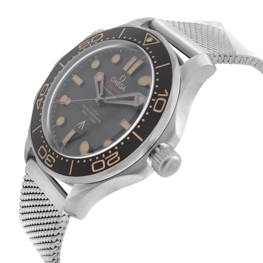 An image of a luxury OMEGA men's wristwatch, captured from a side profile view with the crown visible on the right side. The watch is a display model, featuring a black dial and bezel, round titanium case, and titanium band with a metallic mesh design. Luminous hands are seen on the watch face, and the image is taken at a close distance, focusing on the details of the watch's side and dial.