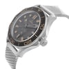 An image of a luxury OMEGA men's wristwatch, captured from a side profile view with the crown visible on the right side. The watch is a display model, featuring a black dial and bezel, round titanium case, and titanium band with a metallic mesh design. Luminous hands are seen on the watch face, and the image is taken at a close distance, focusing on the details of the watch's side and dial.