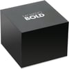 An image of a Movado Bold wristwatch box, viewed from a slightly elevated angle. The box is positioned centrally in the frame, showcasing its sleek, black exterior with the brand name prominently displayed on the top. The background is plain, emphasizing the box's new condition despite the noted defects. The image is taken at a close distance, highlighting the box's clean lines and minimalist design.