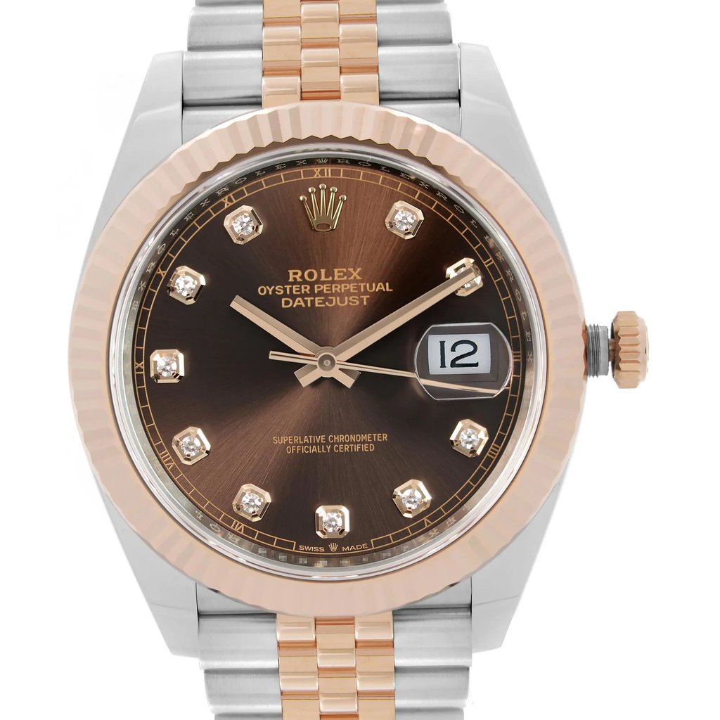 An image of a pre-owned Rolex Oyster Perpetual Datejust men's wristwatch, showcasing a front close-up view of the watch face. The watch is positioned head-on with the camera focused on the dial, capturing fine details from a close distance. The dial features a chocolate sunburst pattern with diamond indices and a date display at 3 o'clock position. A rose gold bezel on the round stainless steel case, complementing the two-tone rose gold and stainless steel band. The watch exhibits good condition with light signs of wear and minor scratches.