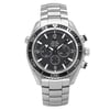 An image of a pre-owned men's OMEGA Seamaster Planet Ocean 45.5mm wristwatch featuring a stainless steel bracelet and case, positioned straight and centered. The watch face is angled slightly forward, displaying its black dial with chronograph subdials, a date indicator, and luminous hands. The distance is close-up, highlighting the detailed bezel and pushers on the side.The bezel of this watch has minor scratches. 