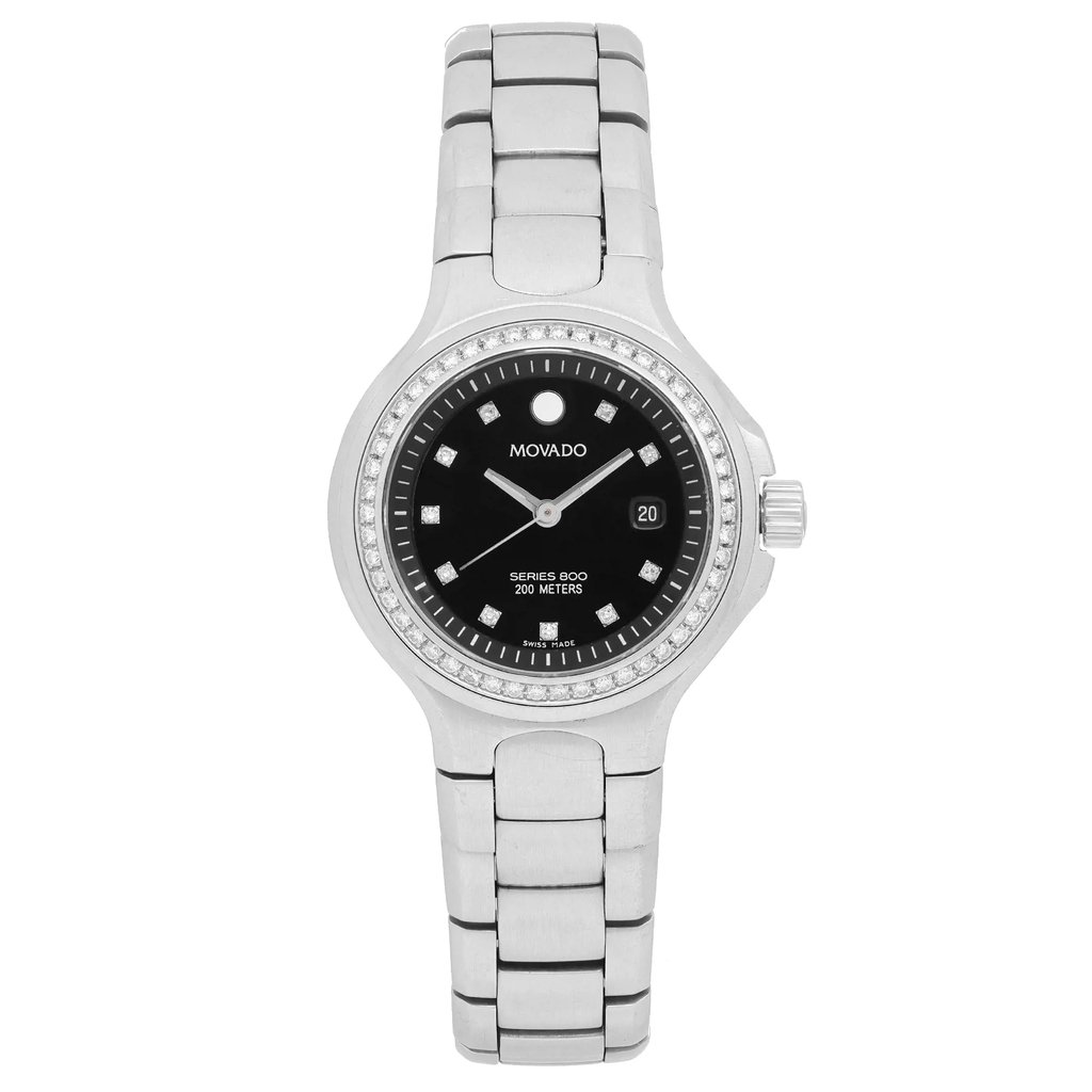 An image of a pre-owned wristwatch captured from a front full frontal view. The watch features a silver metal band and a black dial with minimalist markers. The brand name is displayed on the dial, and the watch has a date function on the right side. The photograph is taken at a close distance, highlighting the watch's design and condition.