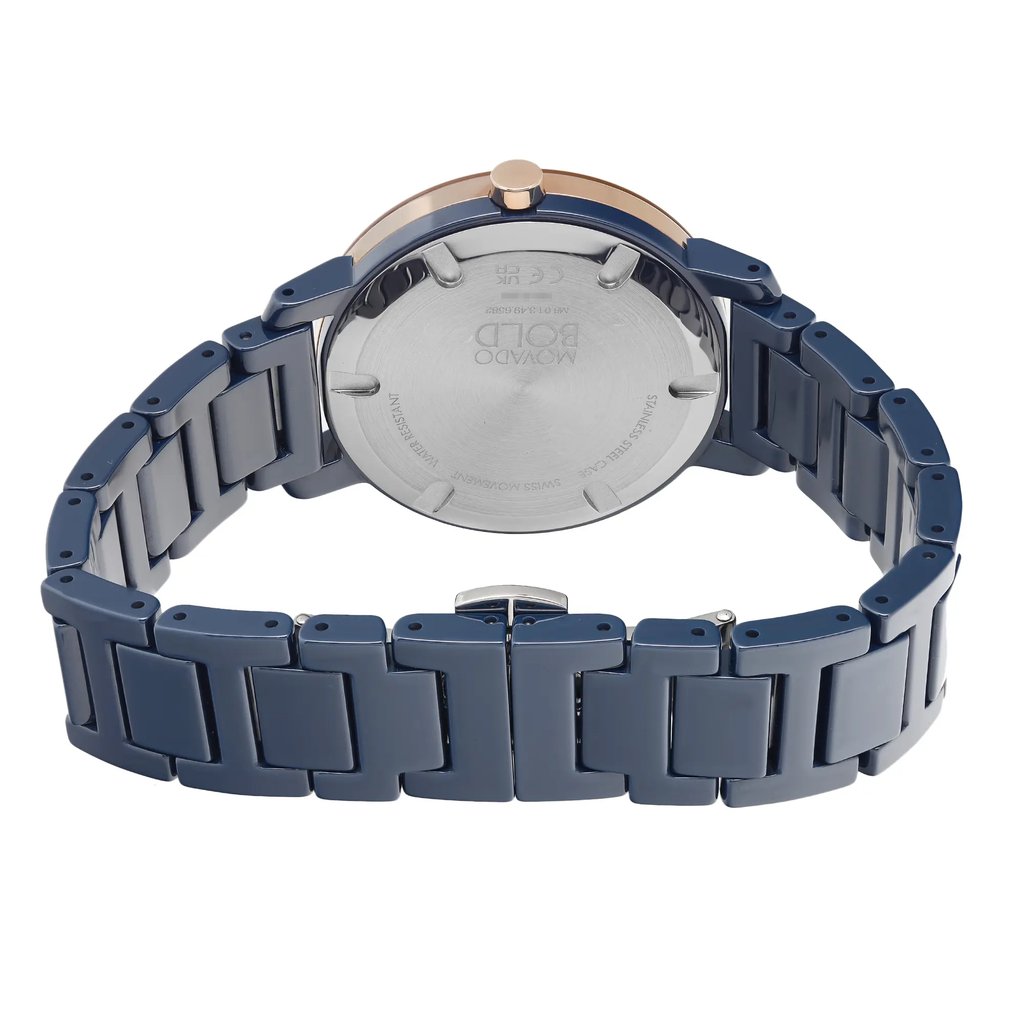 An image of a wristwatch viewed from the back, showcasing the closed clasp. The angle is slightly elevated, capturing the entire bracelet and the back of the watch case. The watch has a metallic body with a polished finish, and the bracelet links are prominently displayed. The image is taken at a close distance, emphasizing the design and craftsmanship of the display model.