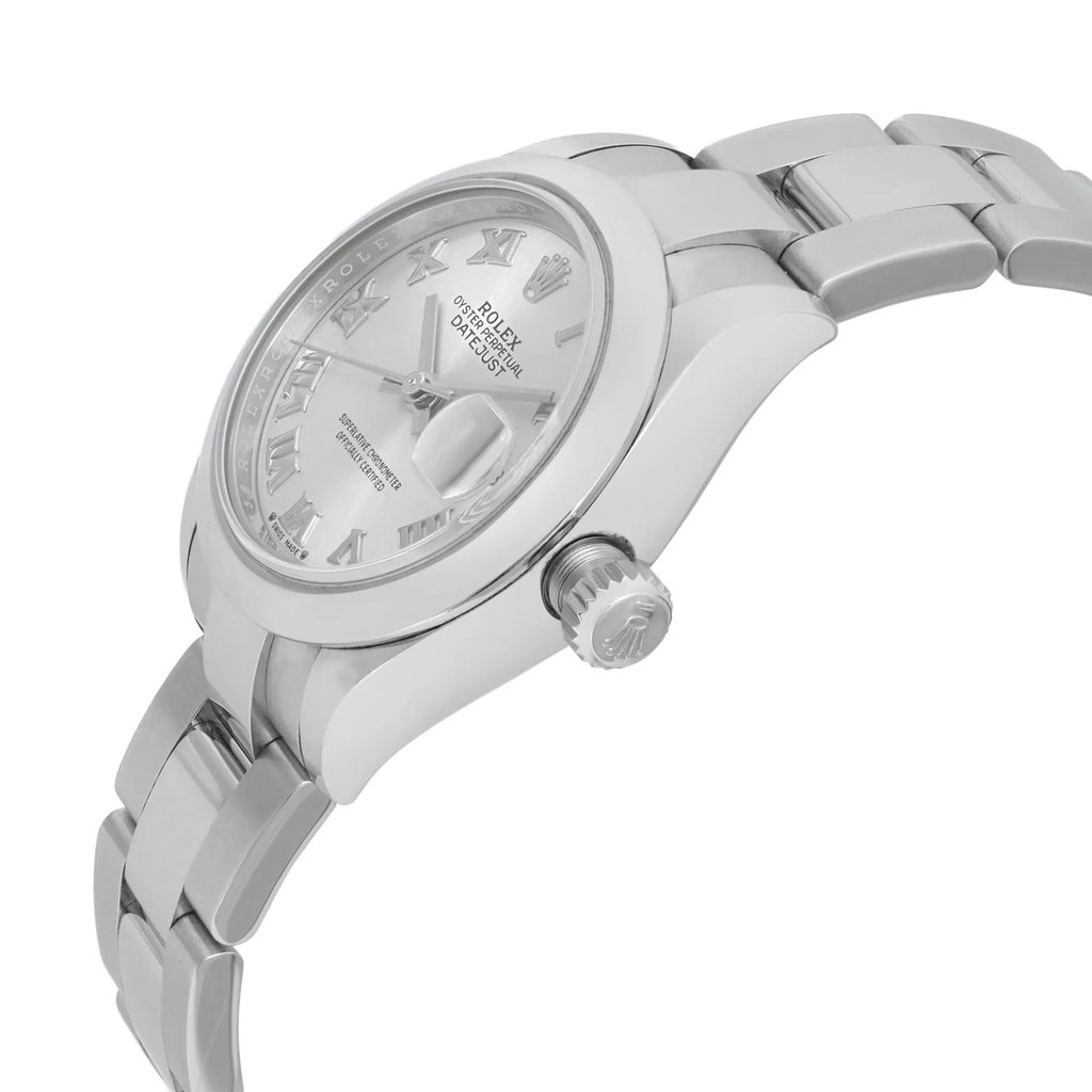 An image of a pre-owned wristwatch in a side profile view, showcasing the crown prominently. The watch features a metallic band and a silver-toned dial with Roman numerals. The angle highlights the sleek design and craftsmanship, with the watch positioned at a slight tilt, taken from a close distance to capture the details.