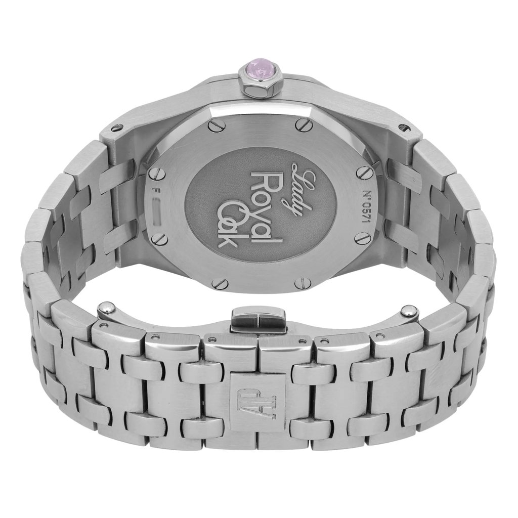 An image of a pre-owned Audemars Piguet women's wristwatch, showcasing the back view. The watch is positioned upright with the metal bracelet spread out, revealing the "Lady Royal Oak" engraving on the back case. The angle captures the watch from a slightly elevated rear perspective, highlighting the bracelet links and clasp, which features the brand's logo. The distance provides a clear and detailed view, emphasizing the watch's craftsmanship.