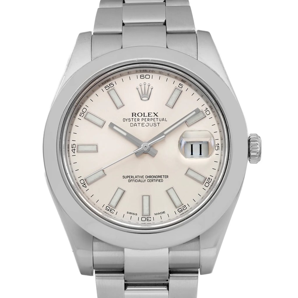 An image of a pre-owned wristwatch captured in a front close-up shot. The focus is on the watch face, highlighting its metallic frame, silver hour markers, and hands. The date window is visible on the right side, and the brand name is centrally positioned below the 12 o'clock marker. The watch's bracelet is partially visible at the top and bottom edges of the image.