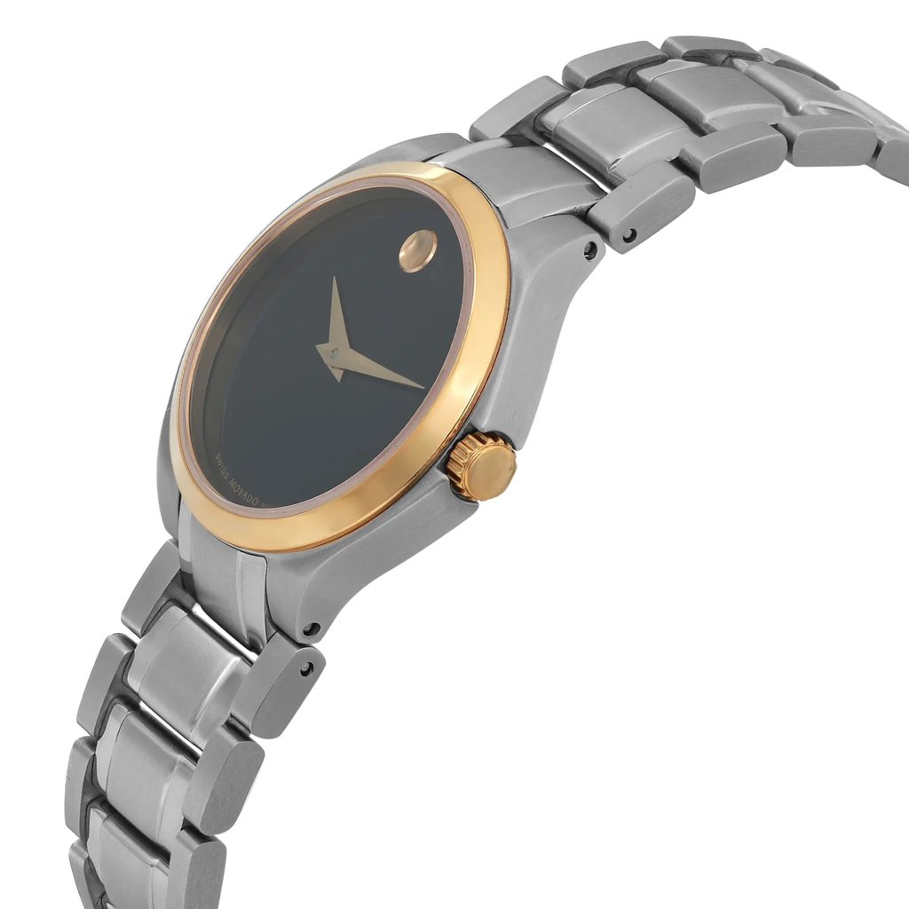 An image of a pre-owned wristwatch captured from a side profile view, highlighting the crown. The watch features a sleek metal bracelet and a round face with a gold bezel. The angle emphasizes the watch's elegant design and craftsmanship.