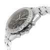 An image of a pre-owned OMEGA men's sport wristwatch, displayed in a side profile view with the crown visible. The watch has a round stainless steel case and band, featuring a black dial with chronograph, date indicator, and luminous hands. The steel bezel has a minor dent. The watch is positioned at a slight angle, with a close-up perspective emphasizing the side profile and details of the watch's face and band.