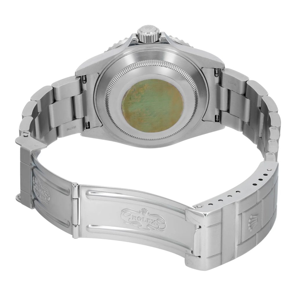 An image of a pre-owned wristwatch shown from the back view with the clasp open. The watch is positioned at a slight angle, allowing a clear view of the metal bracelet and the back of the watch case. The photograph is taken from a close distance, highlighting the details on the clasp and the watch's polished metal finish.