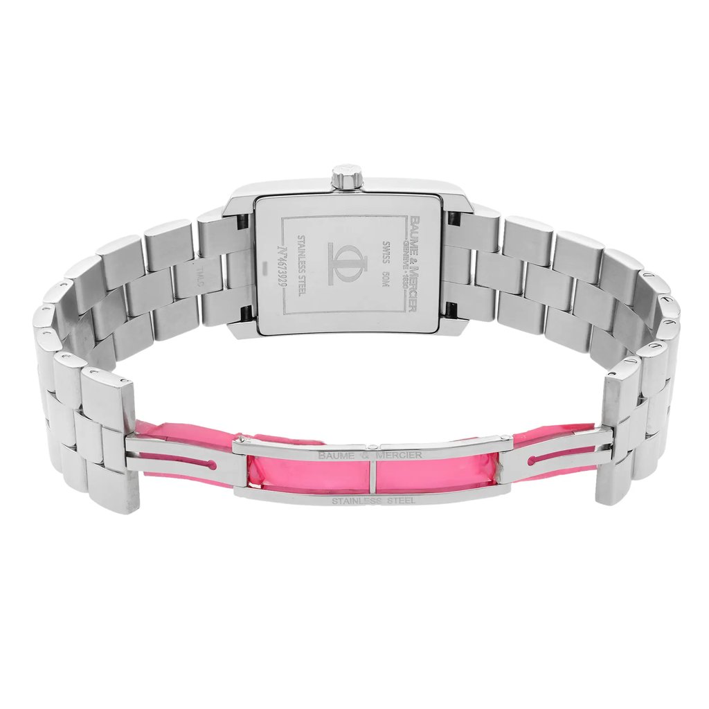 An image of a wristwatch taken from the back view, showcasing the open clasp. The angle is directly from behind, providing a clear view of the stainless steel bracelet and the rectangular watch case. The watch is positioned centrally in the image with the bracelet partially extended, revealing the pink protective film on the inside of the clasp. The image is taken from a close distance, highlighting the details of the display model.