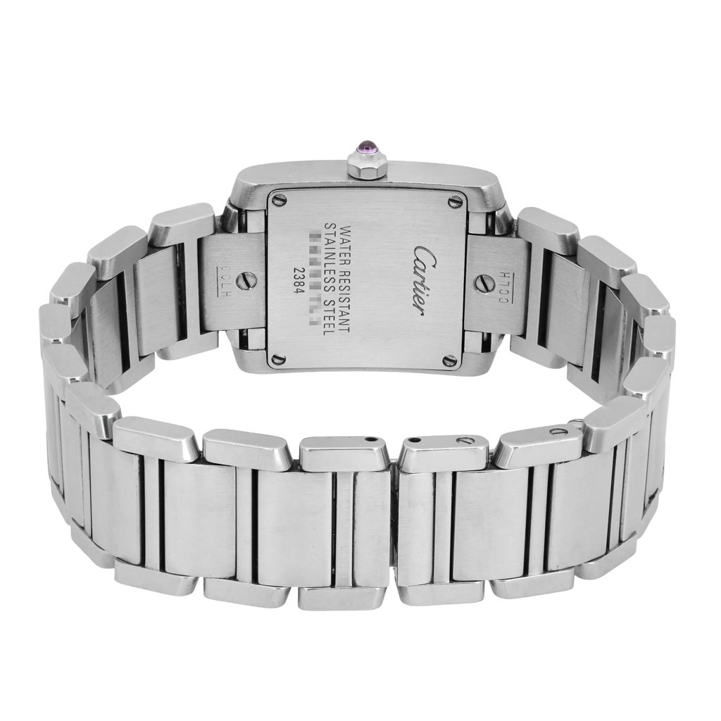 An image of a pre-owned Cartier women's wristwatch, positioned facing away from the viewer to display the back of the watch case and bracelet. The angle is slightly elevated, capturing the entire stainless steel bracelet in a semi-circle. The distance is close, highlighting the inscriptions and details on the watch's back.