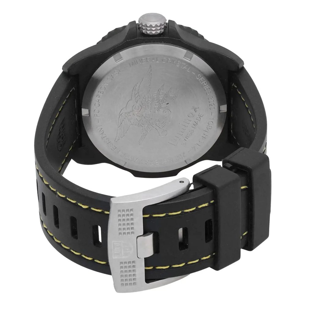 An image of a Wristwatch by Luminox. This Pre Owned item is designed for Men, featuring a Casual,Military style. It has a Quartz movement and an Analog display with a Black dial color. The indices include 12-Hour Dial,Arabic Numerals,Easy to Read/Large Numerals. The band is made of Rubber and the case is made of Carbon. The watch has a Round shape with a case size of 44 mm and a case thickness of 15 mm.
