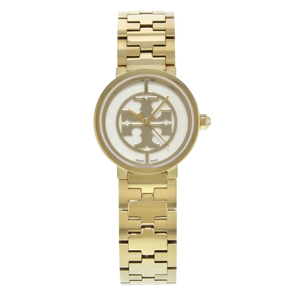 An image of a Wristwatch by Tory Burch. This Pre Owned item is designed for Women, featuring a Dress/Formal style. It has a Quartz movement and an Analog display with a Beige,Gold dial color. The indices include No Hour Marks. The band is made of Stainless Steel and the case is made of Stainless Steel. The watch has a Round shape with a case size of 28 mm and a case thickness of 8 mm.