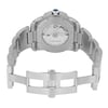 An image of a pre-owned men's Cartier wristwatch viewed from the back, showcasing the open clasp and stainless steel bracelet. The watch is positioned centrally, captured at a slight downward angle to highlight the automatic movement visible through the transparent case back. The distance is close enough to clearly see the brand name and intricate details.