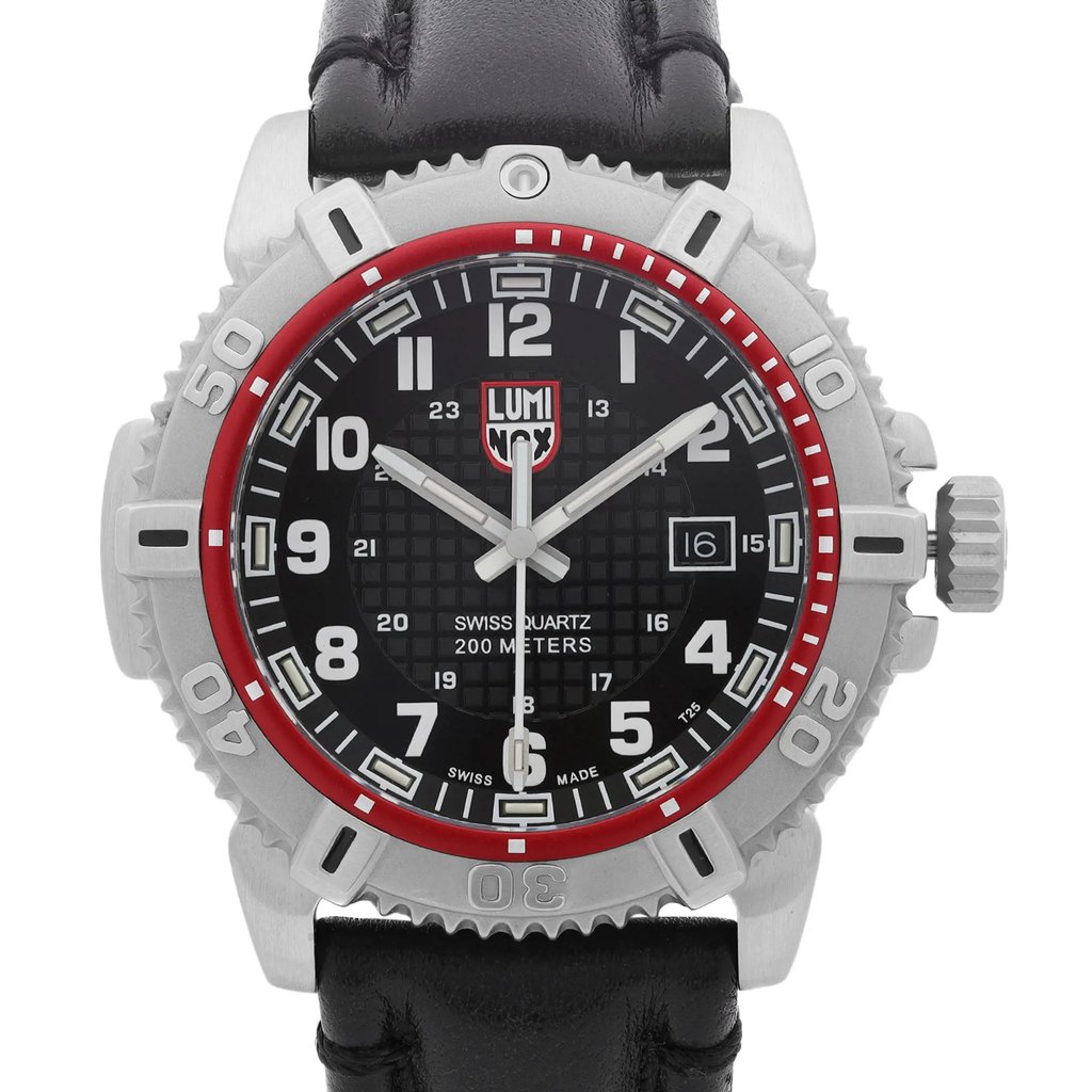 An image of a Wristwatch by Luminox. This Pre Owned item is designed for Men, featuring a Casual,Diver,Military style. It has a Quartz movement and an Analog display with a Black dial color. The indices include 12-Hour Dial,Arabic Numerals,Easy to Read/Large Numerals. The band is made of Leather and the case is made of Stainless Steel. The watch has a Round shape with a case size of 45 mm and a case thickness of 14 mm.