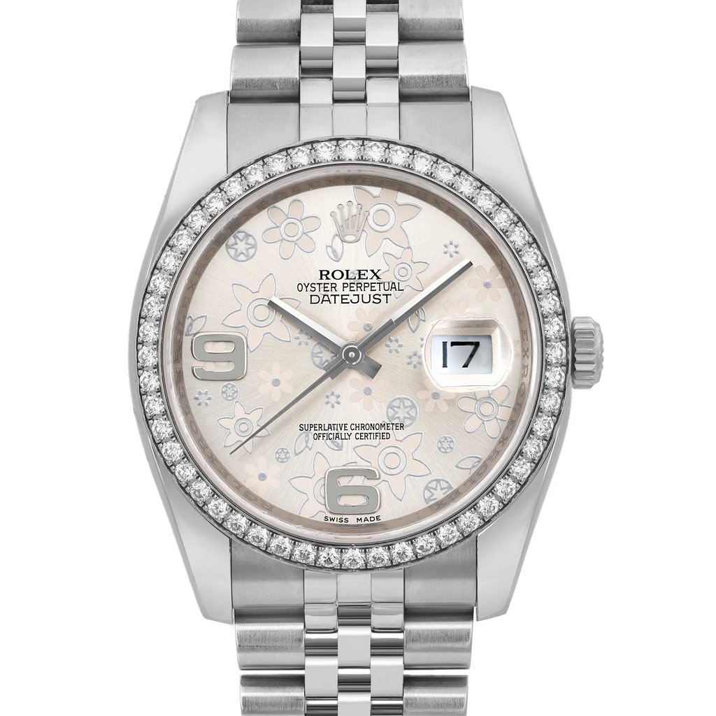An image of a pre-owned women's Rolex wristwatch, viewed from the front at a close distance. The watch features a round face with a silver floral pattern, surrounded by a diamond-studded bezel. The dial displays the date indicator at the 3 o'clock position and has luminous hands. The stainless steel bracelet is partially visible at the top and bottom of the image.