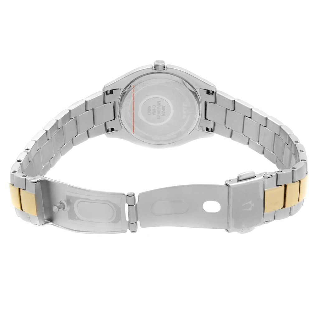 An image of a pre-owned Bulova women's wristwatch, viewed from the back showcasing the solid caseback and stainless steel band. The watch features a tonneau/barrel shape and a two-tone fold-over clasp with double push-button in an open position. The band exhibits alternating silver and gold colors with the clasp prominently displayed in the foreground. The watch is photographed from a top-down angle at a close distance, allowing clear visibility of the watch's design and condition.