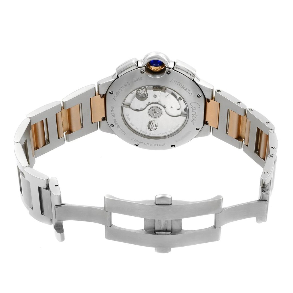 An image of a pre-owned Cartier men's wristwatch, viewed from the back with the clasp open. The watch is positioned at a slight angle, with the top of the watch tilting away from the viewer providing a clear view of the exhibition caseback. The stainless steel and solid gold band spans outward from the round case, with the double-locking fold-over clasp partially extended to the right, displaying its stainless steel construction. The distance is close-up, focusing on the intricate details and craftsmanship of the watch's design.
