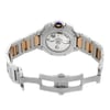 An image of a pre-owned Cartier men's wristwatch, viewed from the back with the clasp open. The watch is positioned at a slight angle, with the top of the watch tilting away from the viewer providing a clear view of the exhibition caseback. The stainless steel and solid gold band spans outward from the round case, with the double-locking fold-over clasp partially extended to the right, displaying its stainless steel construction. The distance is close-up, focusing on the intricate details and craftsmanship of the watch's design.