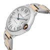 An image of a pre-owned wristwatch viewed from a side profile, showcasing the crown prominently. The angle highlights the watch's face with Roman numeral hour markers and a two-tone metal bracelet. The watch is positioned close-up, allowing detailed observation of its design and condition.