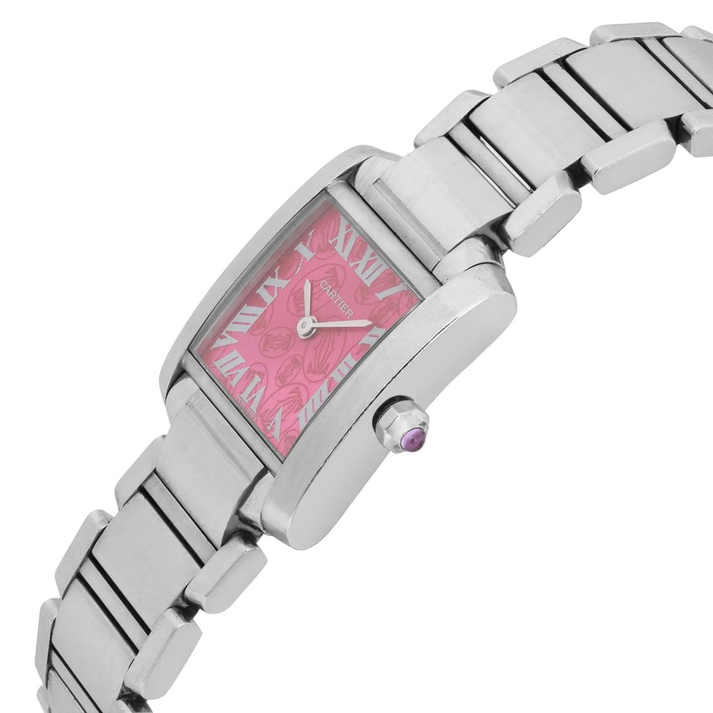 An image of a pre-owned women's Cartier wristwatch taken from an angled side view. The watch is positioned diagonally with the stainless steel bracelet extending upward. The pink rectangular dial features Roman numeral hour markers and elegant watch hands, and there is a cabochon crown visible on the side. The angle highlights the watch's sleek design and metallic sheen.