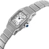An image of a pre-owned Cartier wristwatch for women in a luxury style, captured from a side profile angle with the crown visible. The watch has a square shape with a white dial, gray bezel, and is constructed from stainless steel for both the band and case. The photo is taken from a close distance, emphasizing the watch's side with clear visibility of the texture and details on the band and case.
