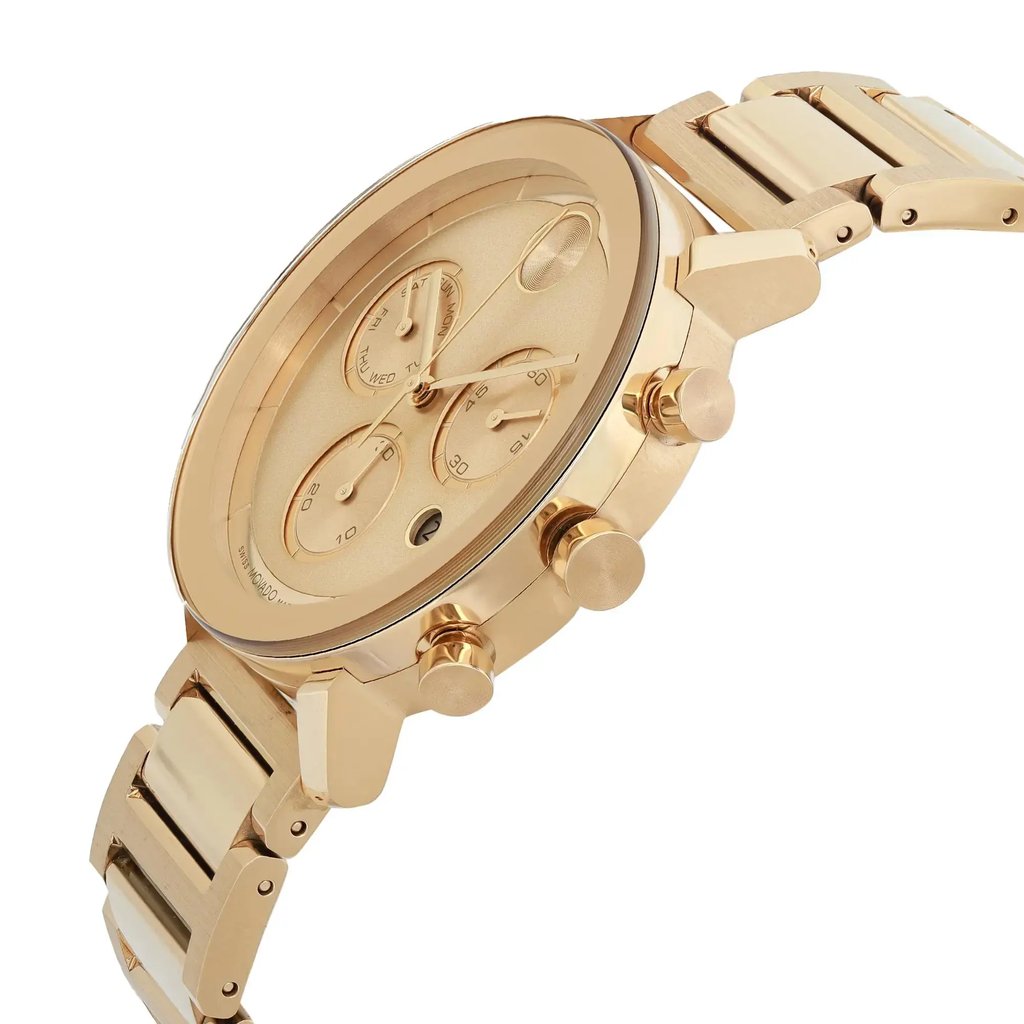 An image of a pre-owned wristwatch taken from a side profile view. The watch's crown and pushers are prominently visible on the right side, with the face angled slightly upwards. The gold-toned bracelet and case reflect light, emphasizing the watch's polished finish. The image is taken from a close distance, showcasing detailed features such as the sub-dials on the watch face.