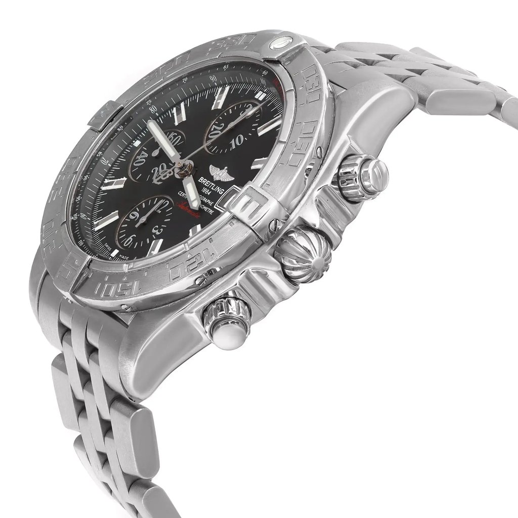 An image of a pre-owned Breitling men's wristwatch in a pilot/aviator style. The photo shows a side profile view of the watch, with the crown and two push-buttons prominently displayed. The watch features a round stainless steel case and a matching stainless steel band. It has a black dial with white markings and a gray bezel. The watch is positioned at a slight angle, with the watch face visible and the band extending into the background, giving a clear view of the watch's design and features. The images show minor patina on the hour markers and light scratches on the bezel.