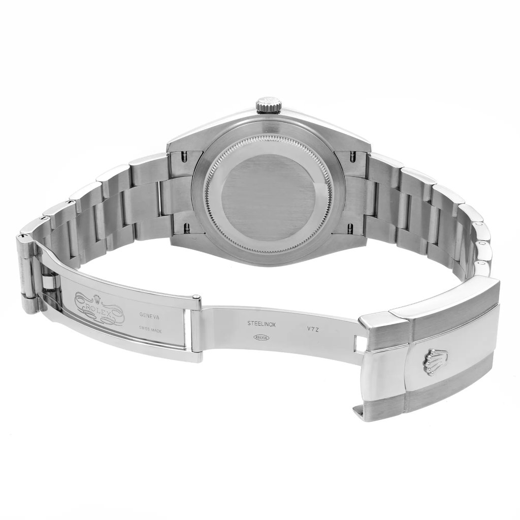 Back View Of Solid Back Case And Open Stainless Steel Band Of Rolex 126300-0003 Watch Unworn Condition