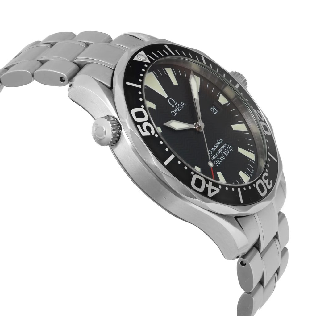 An image of a pre-owned wristwatch viewed from the side profile, opposite the crown. The watch is positioned at a slight angle, showcasing its metallic bracelet and detailed black bezel with white markings. The watch face displays luminous hour markers and hands, with a date window visible. The image captures the watch from a close distance, highlighting its polished stainless steel finish.