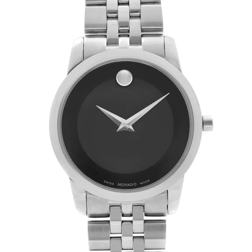 An image of a wristwatch showing a close-up front view of the watch face. The watch has a sleek black dial with silver hour and minute hands, and a minimalist design featuring a single dot at the 12 o'clock position. The timepiece is framed by a polished silver case and is attached to a matching silver metal bracelet. The image captures the watch in pristine display model condition.