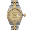An image of a pre-owned wristwatch captured in a front close-up shot of the watch face. The timepiece features a gold-toned dial with diamond hour markers and a date display at the 3 o'clock position. The bezel is fluted and the band is a combination of gold and silver links. The angle highlights the intricate details and craftsmanship of the watch.